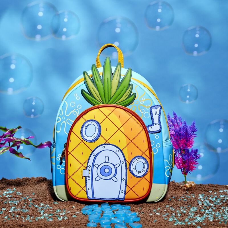 Mini backpack featuring SpongeBob's pineapple house against a blue background with bubbles